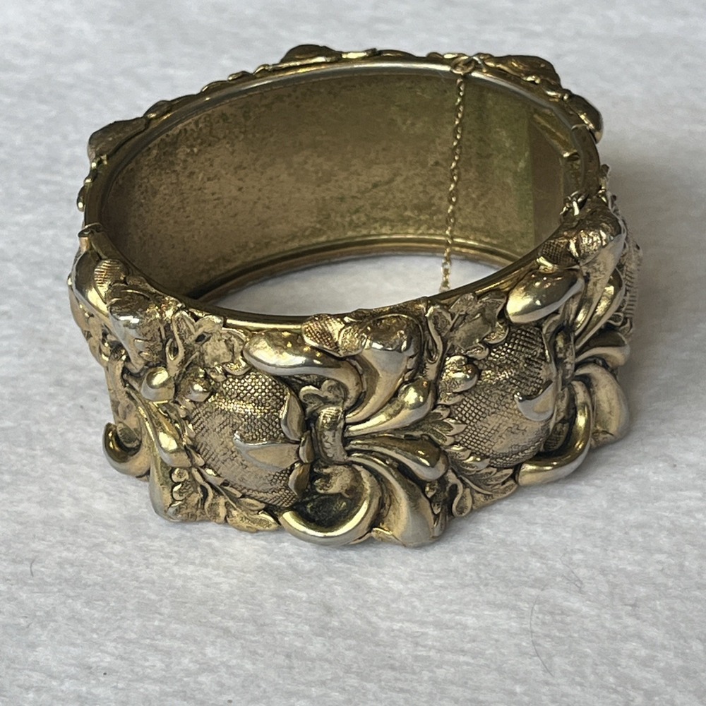 Large 1970s Bangle Bracelet Gold Plated Fleur de Lis Motif w/ Safety Chain
